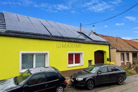 Dom s fotovoltaickými panelmi a elektrickým vykurovaním